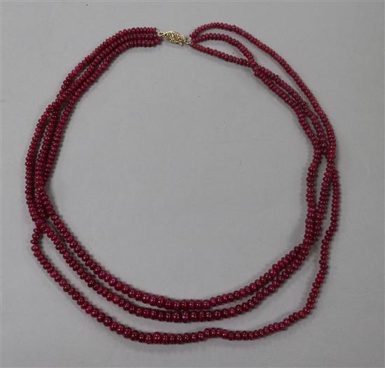 A multi strand graduated ruby bead necklace, with 14ct gold clasp, 44cm.